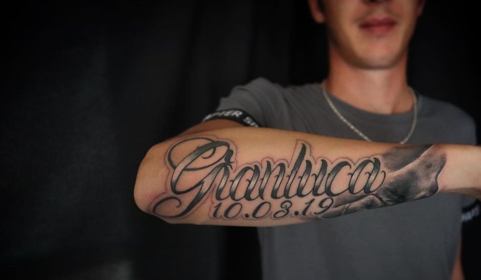 Schriftzug Tatoo